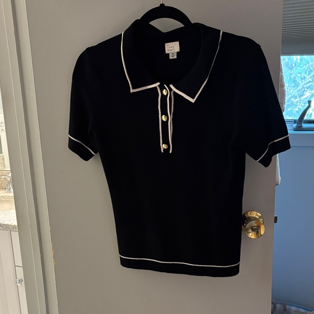 A New Day Black Polo with White Accents
